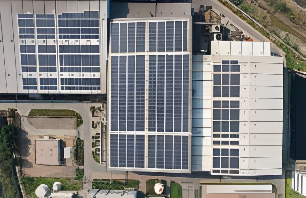 Rooftop array on an industrial complex, top view, Gujarat